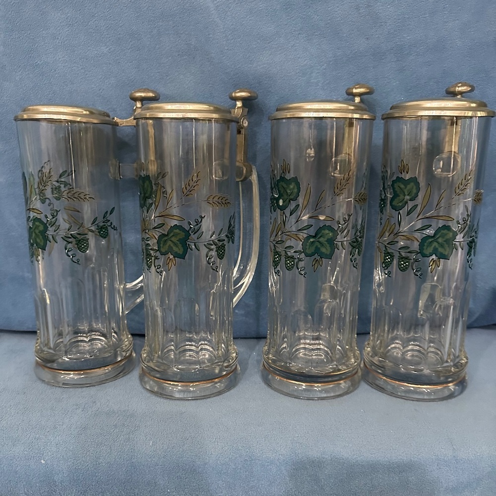 Vintage set of 4 Domex glass beer steins.
